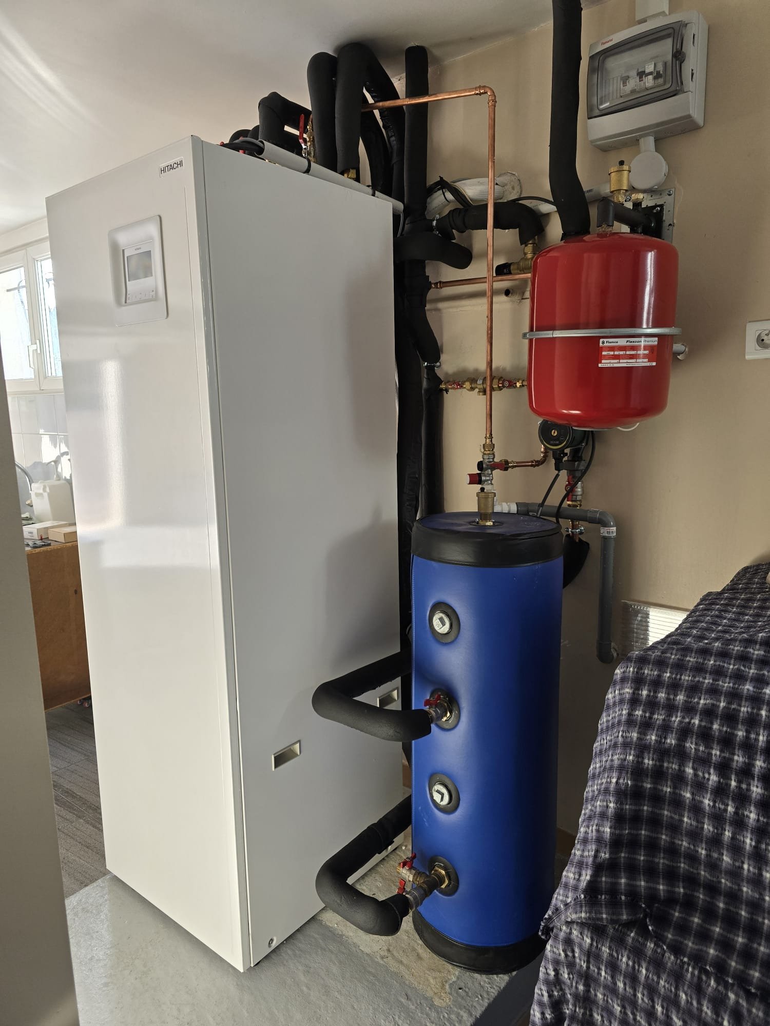 Schéma d’un système de pompe à chaleur pour le chauffage et la production d’eau chaude